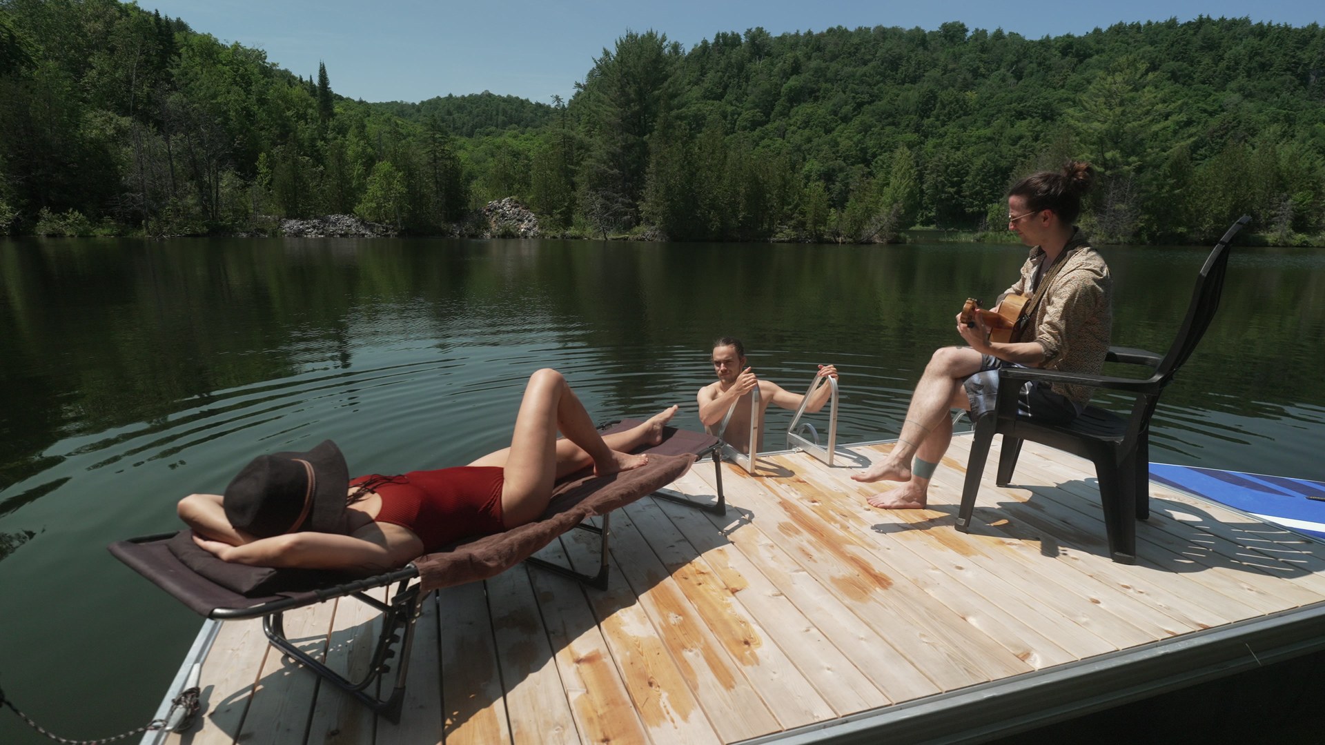 Couple at the dock edge looking at White Rocks Lake — Maison Kilmar